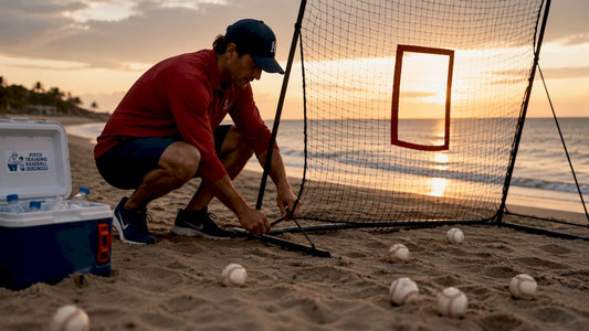 Youth baseball coach setting up pitching training equipment outdoors