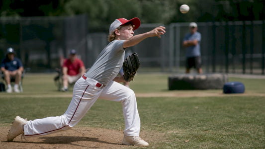 Youth pitcher throwing fastball on field