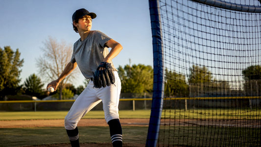 Left-handed pitcher beside repositioned screen