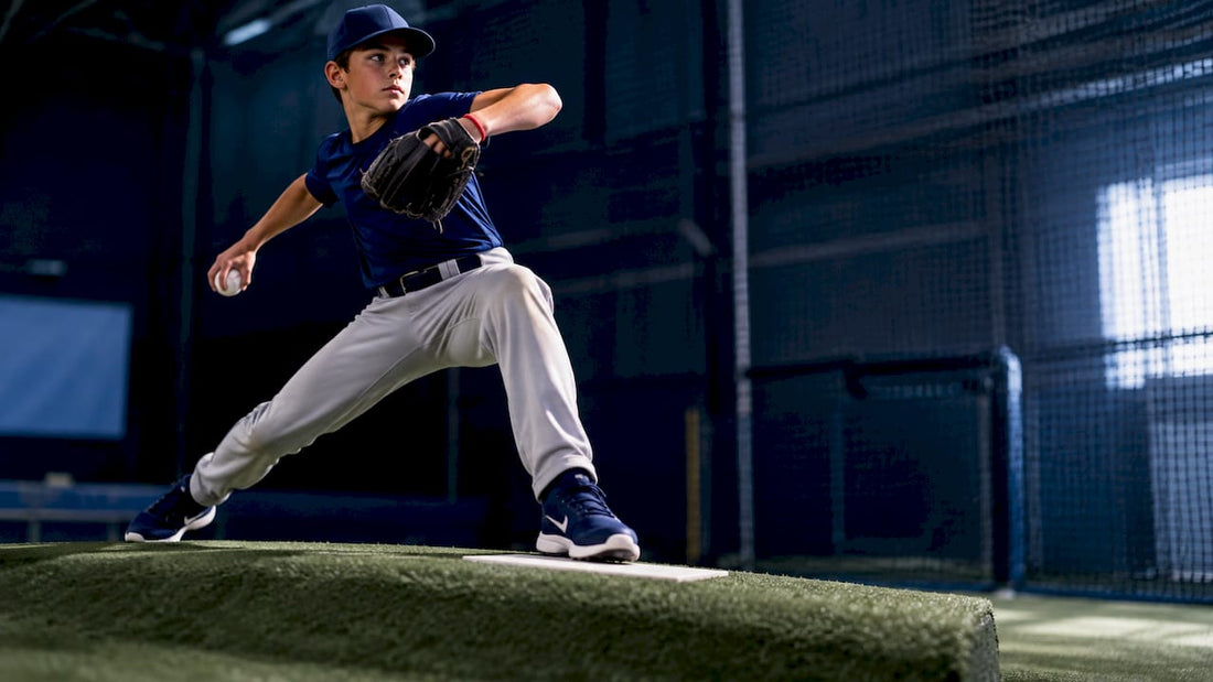 Youth pitcher using a portable pitching mound