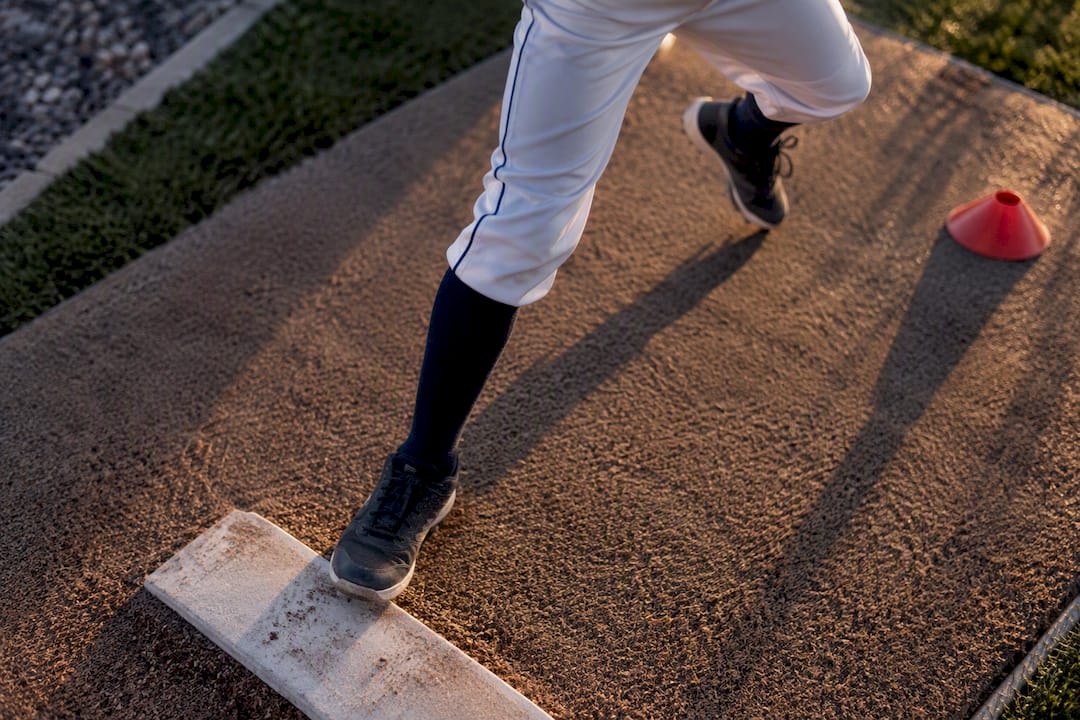 Youth pitcher setting pivot foot