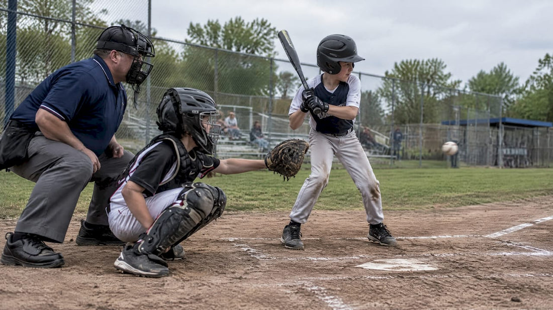 Umpire watching a pitch cross home plate